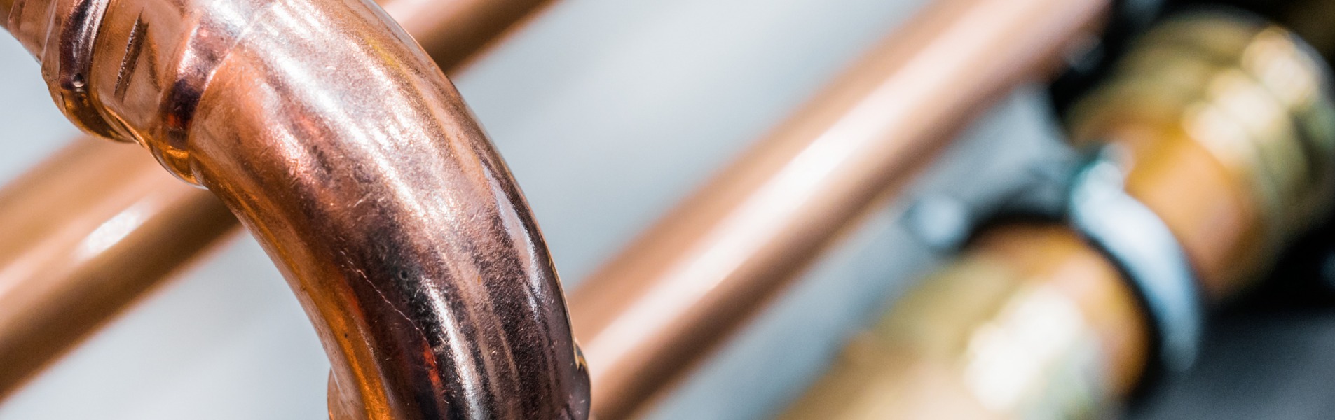 Copper pipes in a commercial plumbing installation