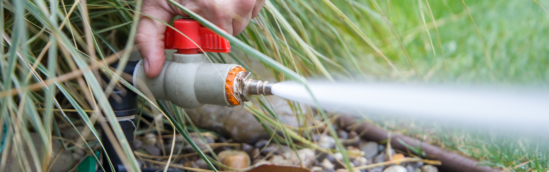 A technician from TCI Companies winterizes an irrigation system after irrigation installation in Central Illinois.