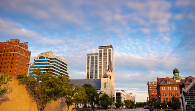 The skyline of Peoria, IL at sunset